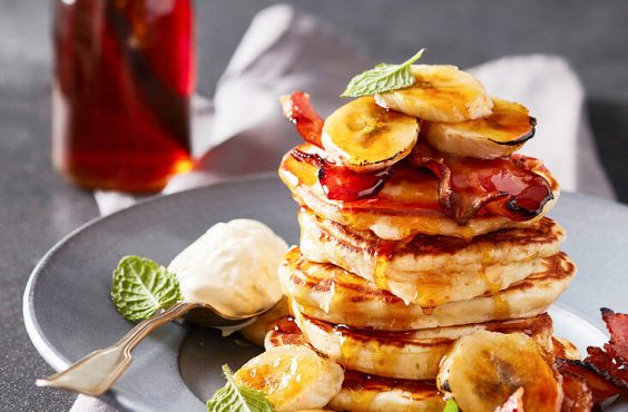 Fried banana, bacon and ricotta flapjack stack