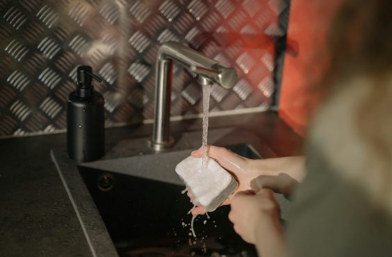 washing the air fryer with a soft sponge